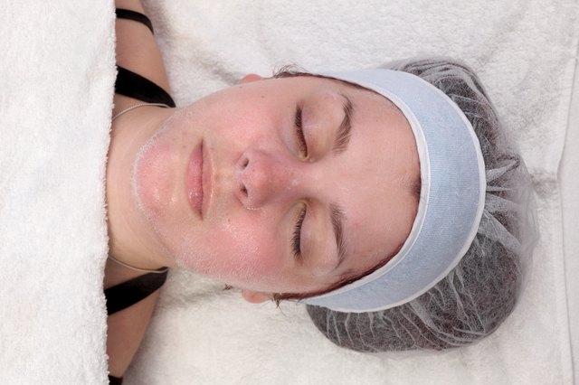 Beauty treatment of young female face, ozone facial steamer