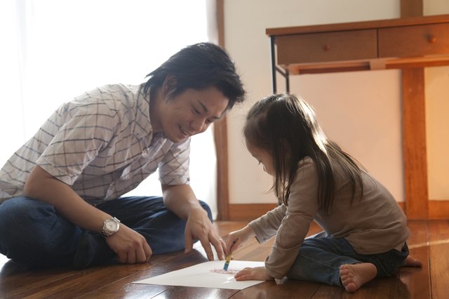 Father and Daughter Drawing Picture