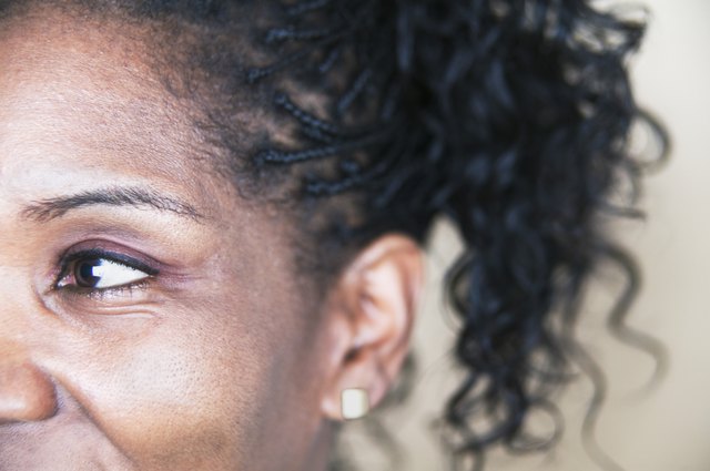 Mid adult woman looking at the side