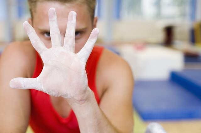 Male gymnast's chalky hand