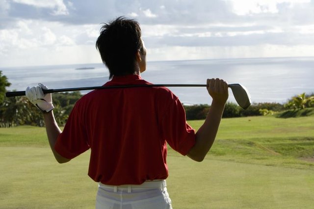 Man Holding Golf Club on His Shoulder