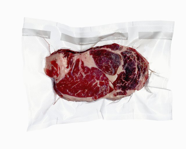 Vacuum sealed frozen cut of beef
