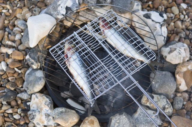 Roasting fish outdoors