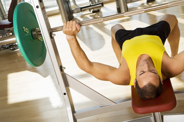 Man using bench press