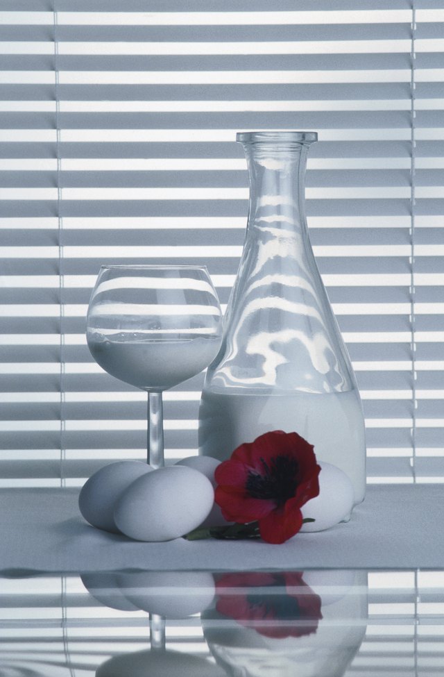Elegant still life of milk and eggs