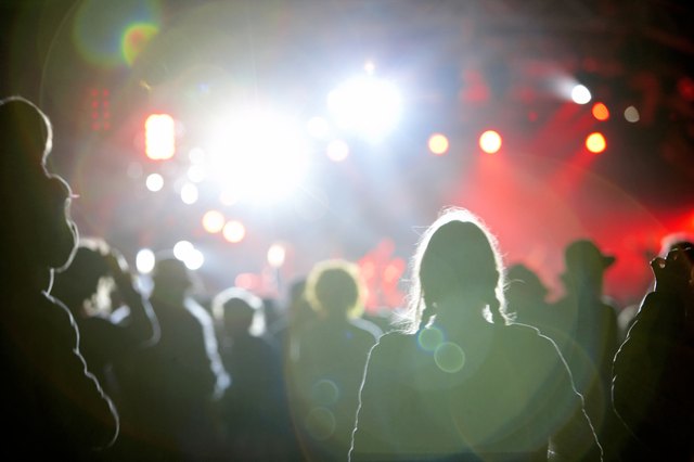 "Partygoers at nightclub, rear view"