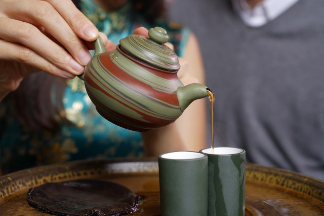 Woman pouring tea