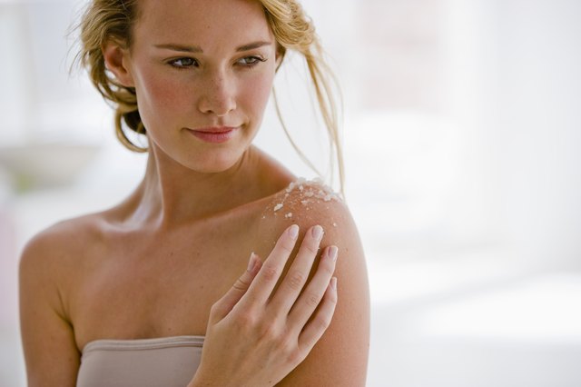Woman using body salts