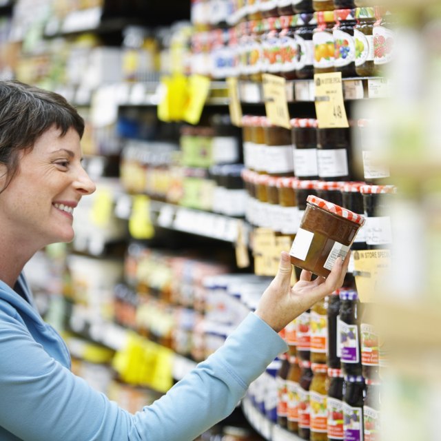 Woman Selecting Jam at Store