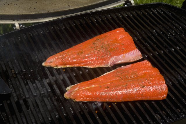 Barbecue scene, Salmon steaks on the grill.