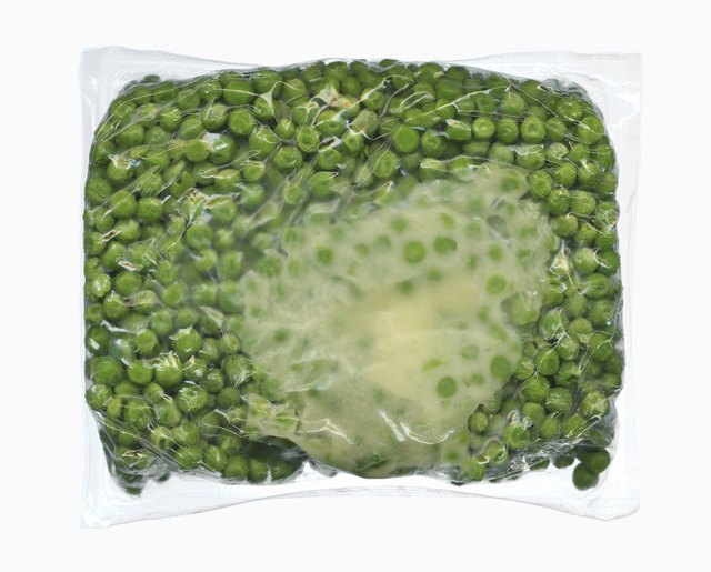 Vacuum packed block of frozen peas
