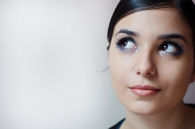 Pensive beautiful woman.