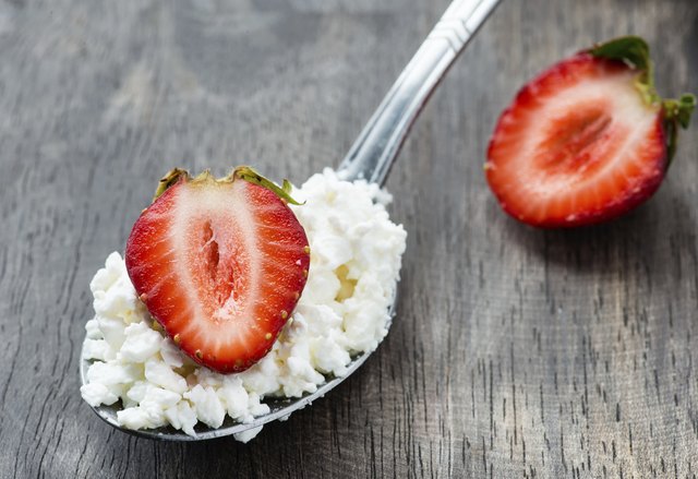 Strawberry and cottage cheese in spoon
