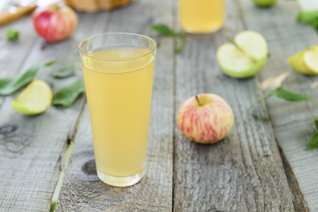 Fresh homemade apple juice and apples