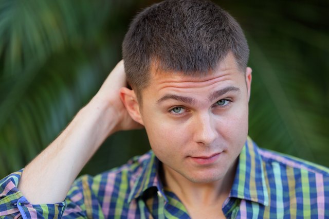 Man scratching his head