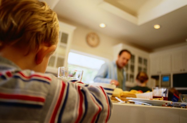 Boy Sitting at the Kitchen Table