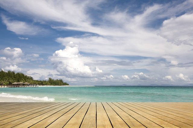wooden platform beside the sea