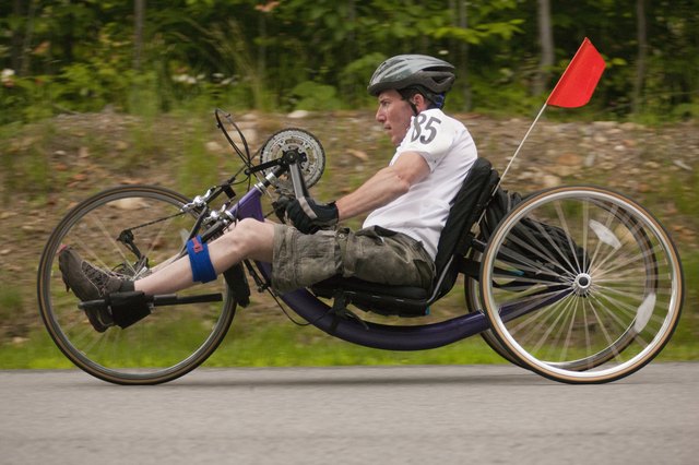 Man with spinal cord injury participating in a handcycle race