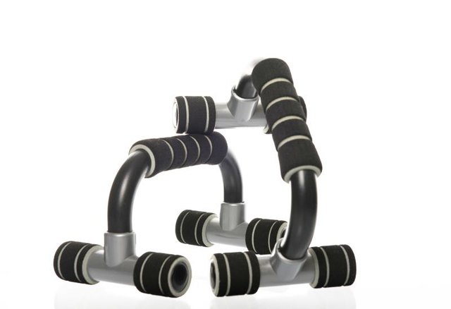 push-up bars with reflection in a studio