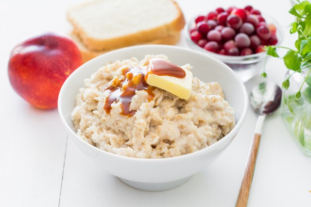Healthy breakfast: oatmeal porridge and fruits