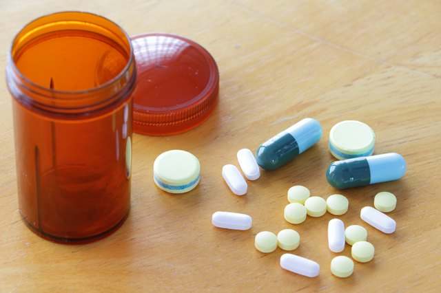 Medicine on wooden table