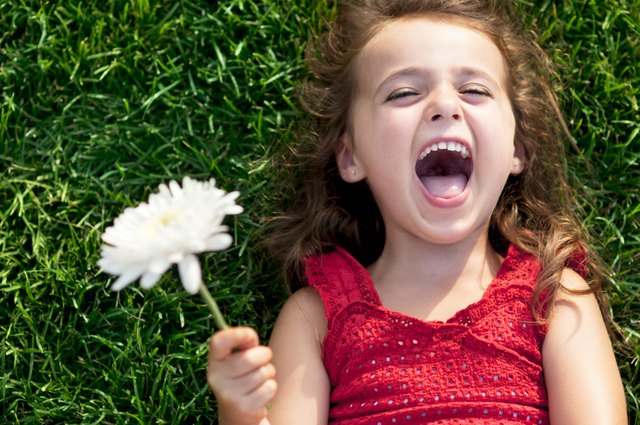 Close-up of a smiling little girl