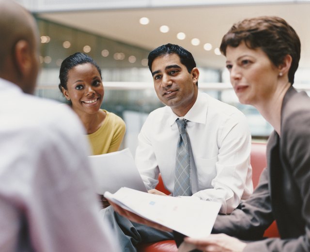 Business People Sitting Talking in an Office Building