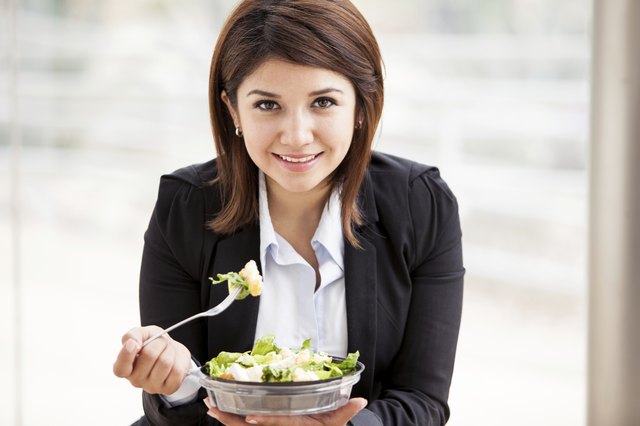 Cute businesswoman on lunch break