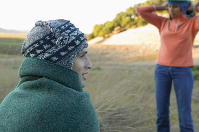 Rear view of couple wearing stocking caps