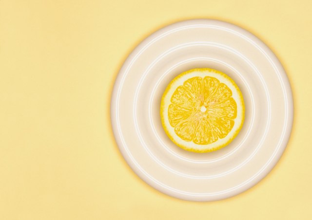 Sliced lemon on plate