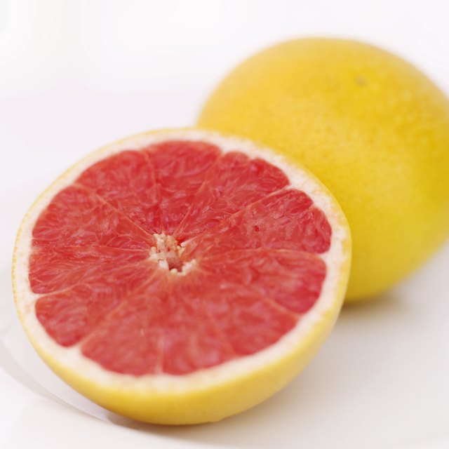close-up of sliced grape fruit on a plate