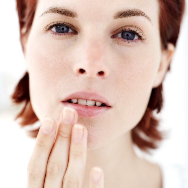 portrait of a woman touching her lip