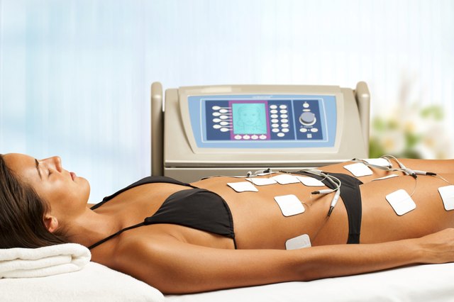 Woman having electrical lymphatic drainage.