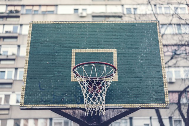 Basketball hoop with backboard in residential district