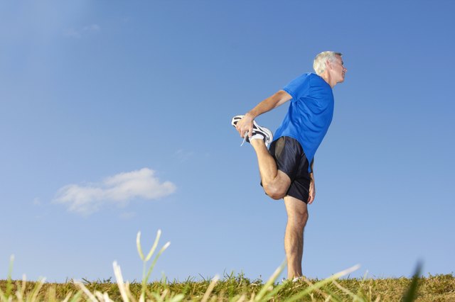 Mature Man Stretching Muscles
