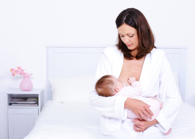 Mother feeding baby with breast