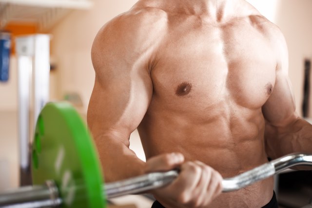 muscular man lifting barbell