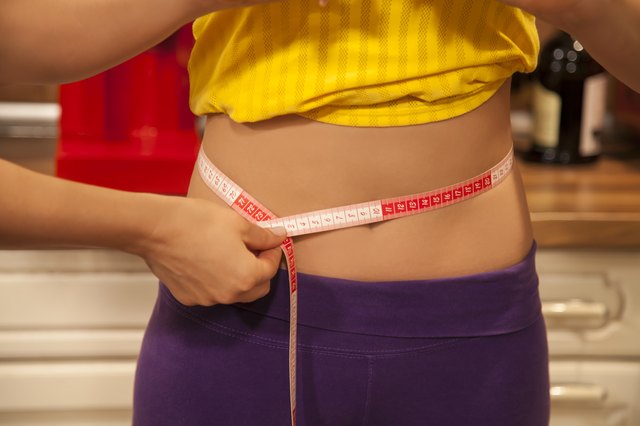 Close-up of waist measurement.
