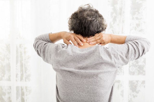 senior woman with neck pain