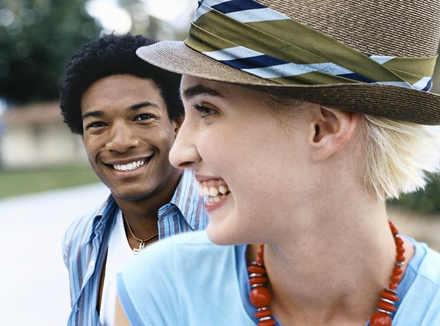 Cool Twentysomething Man and Woman, Close-up of Woman Wearing a Trilby Hat