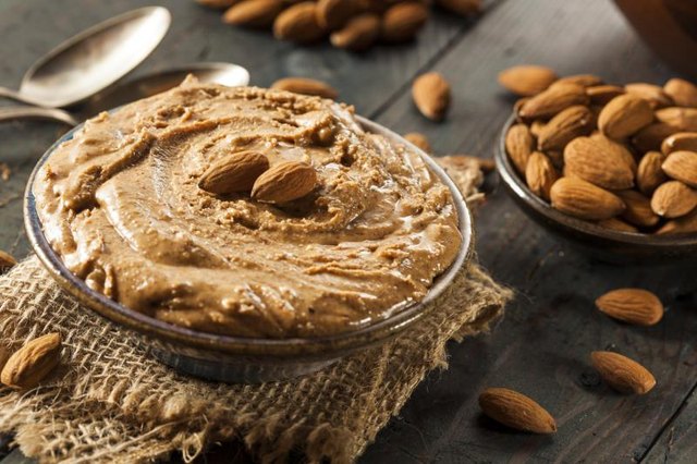 Raw Organic Almond Butter on a Background