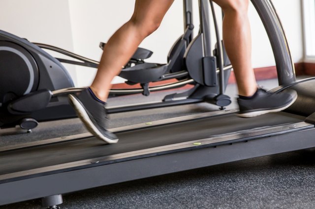Man warming up on treadmill