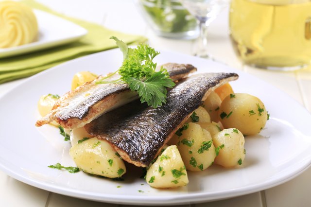 Pan fried trout fillets with potatoes - still life