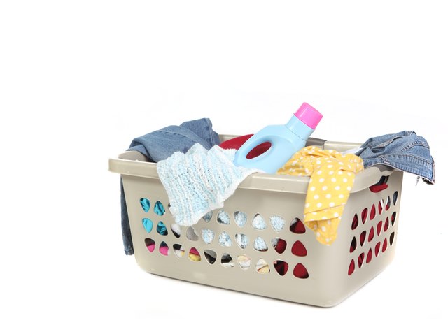 Basket Full of Dirty Laundry With Detergent