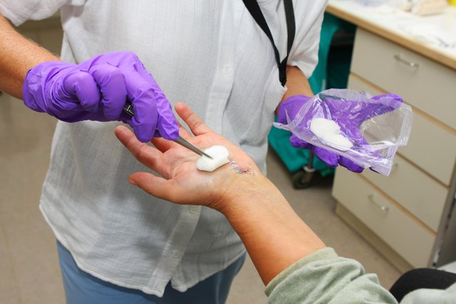 Nurse is taking care of the patient