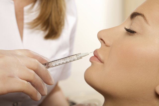 beautiful woman having an injection