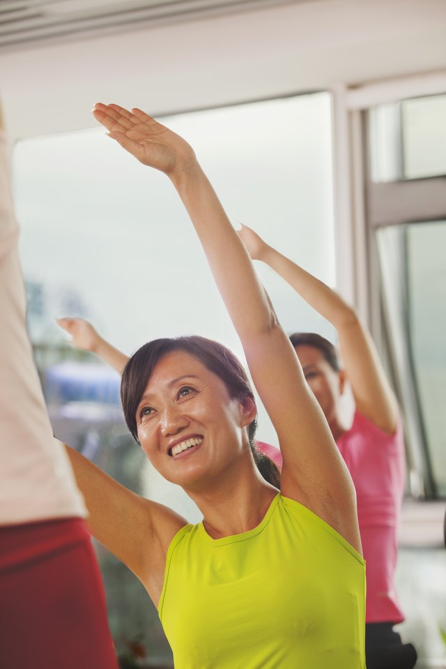 Mature women exercising in the gym