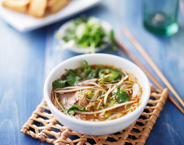 bowl of vietnamese pho with sliced beef