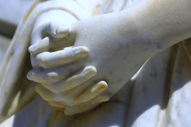 Detail of marble Virgin Mary praying hands