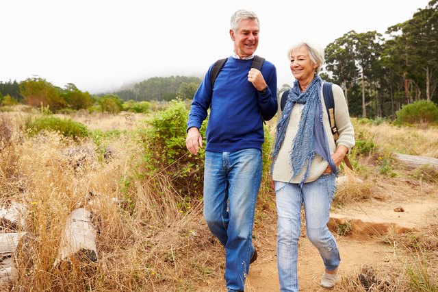 Senior couple walking together in a forest